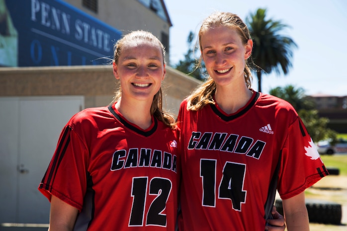 Canadian Army soldiers and biological sisters Lt. Sandy Edmison, left, and Capt. Abby Edmison, right, are both members of the 2016 Canadian Military Women’s Basketball Team. The sisters pose together here after the Canada vs. Brazil game at the Conseil International Du Sport Militaire (CISM) World Military Women’s Basketball Championship July 27 at Camp Pendleton, California. The base is hosting the CISM World Military Women’s Basketball Championship July 25 through July 29 to promote peace activities and solidarity among military athletes through sports. (U.S. Marine Corps photo by Sgt. Abbey Perria)