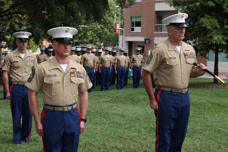 Sgt. Maj. Jim E. Lanham relinquished his post at Marine Corps Recruiting Station Raleigh to Sgt. Maj. Jonathan W. Clark during a relief and appointment ceremony June 30 at the North Carolina State University Memorial Bell Tower. Lanham is to report to Okinawa, Japan, as the 31st Marine Expeditionary Unit sergeant major. (U.S. Marine Corps photo by Sgt. Antonio J. Rubio/Released)