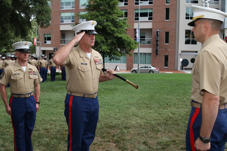 Sgt. Maj. Jim E. Lanham relinquished his post at Marine Corps Recruiting Station Raleigh to Sgt. Maj. Jonathan W. Clark during a relief and appointment ceremony June 30 at the North Carolina State University Memorial Bell Tower. Lanham is to report to Okinawa, Japan, as the 31st Marine Expeditionary Unit sergeant major. (U.S. Marine Corps photo by Sgt. Antonio J. Rubio/Released)