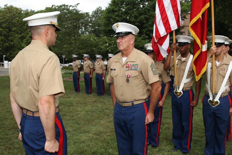 Sgt. Maj. Jim E. Lanham relinquished his post at Marine Corps Recruiting Station Raleigh to Sgt. Maj. Jonathan W. Clark during a relief and appointment ceremony June 30 at the North Carolina State University Memorial Bell Tower. Lanham is to report to Okinawa, Japan, as the 31st Marine Expeditionary Unit sergeant major.(U.S. Marine Corps photo by Sgt. Antonio J. Rubio/Released)