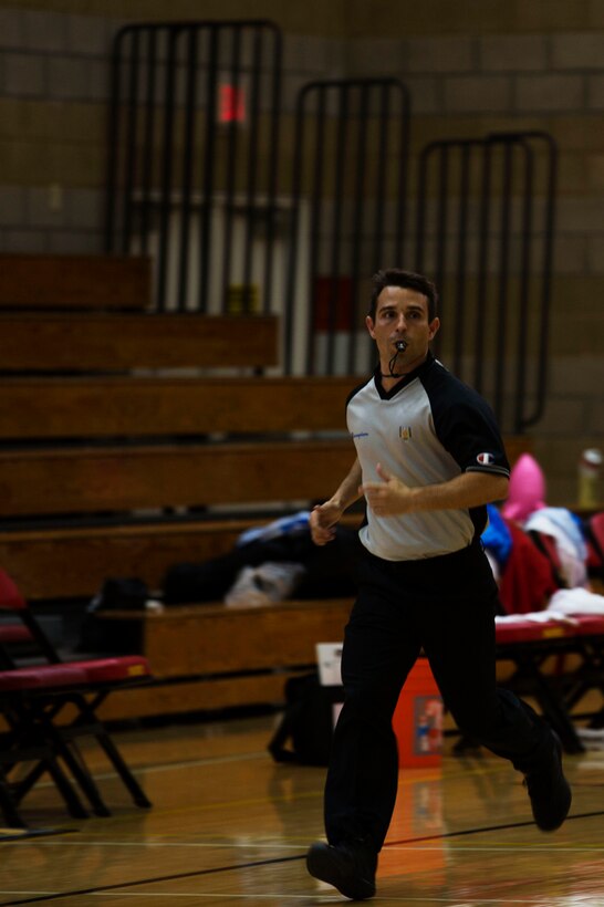 Brazil Army Sgt. Adriano Almeida runs downcourt while refereeing the Germany vs. United States basketball game at the Conseil International Du Sport Militaire (CISM) World Military Women’s Basketball tournament July 28 at Camp Pendleton, California. The base is hosting the CISM World Military Women’s Basketball Championship July 25 through July 29 to promote peace activities and solidarity among military athletes through sports.  The United States is hosting teams from Brazil, Canada, China, France, and Germany.   (U.S. Marine Corps photo by Sgt. Abbey Perria)