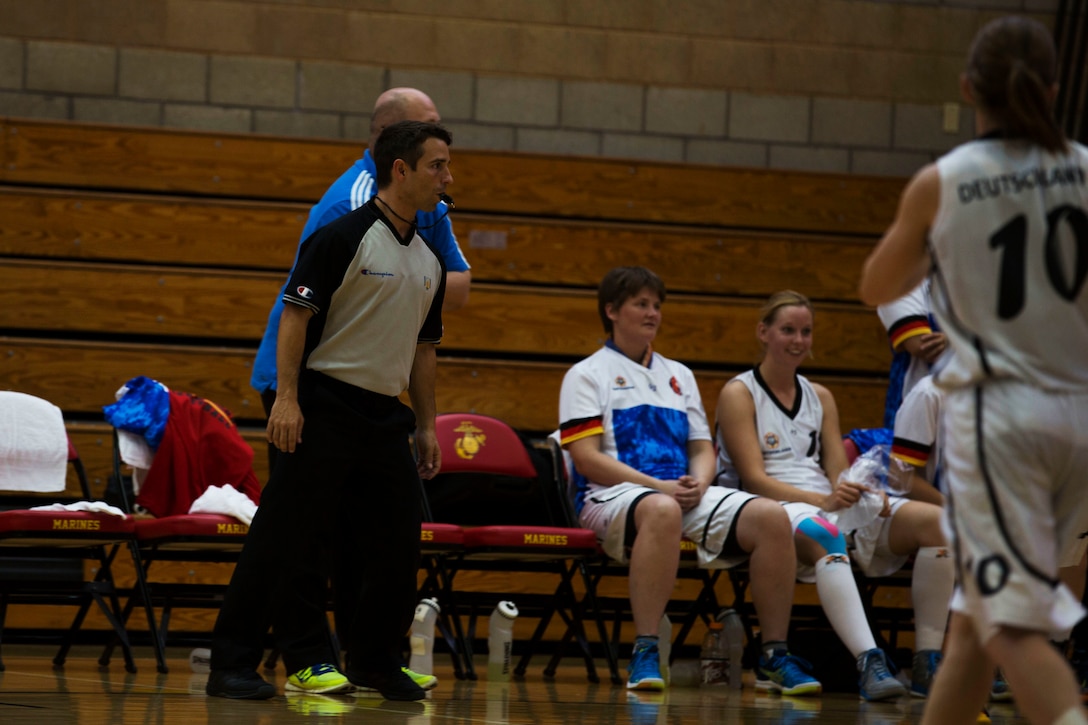 Brazil Army Sgt. Adriano Almeida referees the Germany vs. United States game during the Conseil International Du Sport Militaire (CISM) World Military Women’s Basketball tournament  July 28 at Camp Pendleton, California. The base is hosting the CISM World Military Women’s Basketball Championship July 25 through July 29 to promote peace activities and solidarity among military athletes through sports.  The United States is hosting teams from Brazil, Canada, China, France, and Germany.   (U.S. Marine Corps photo by Sgt. Abbey Perria)