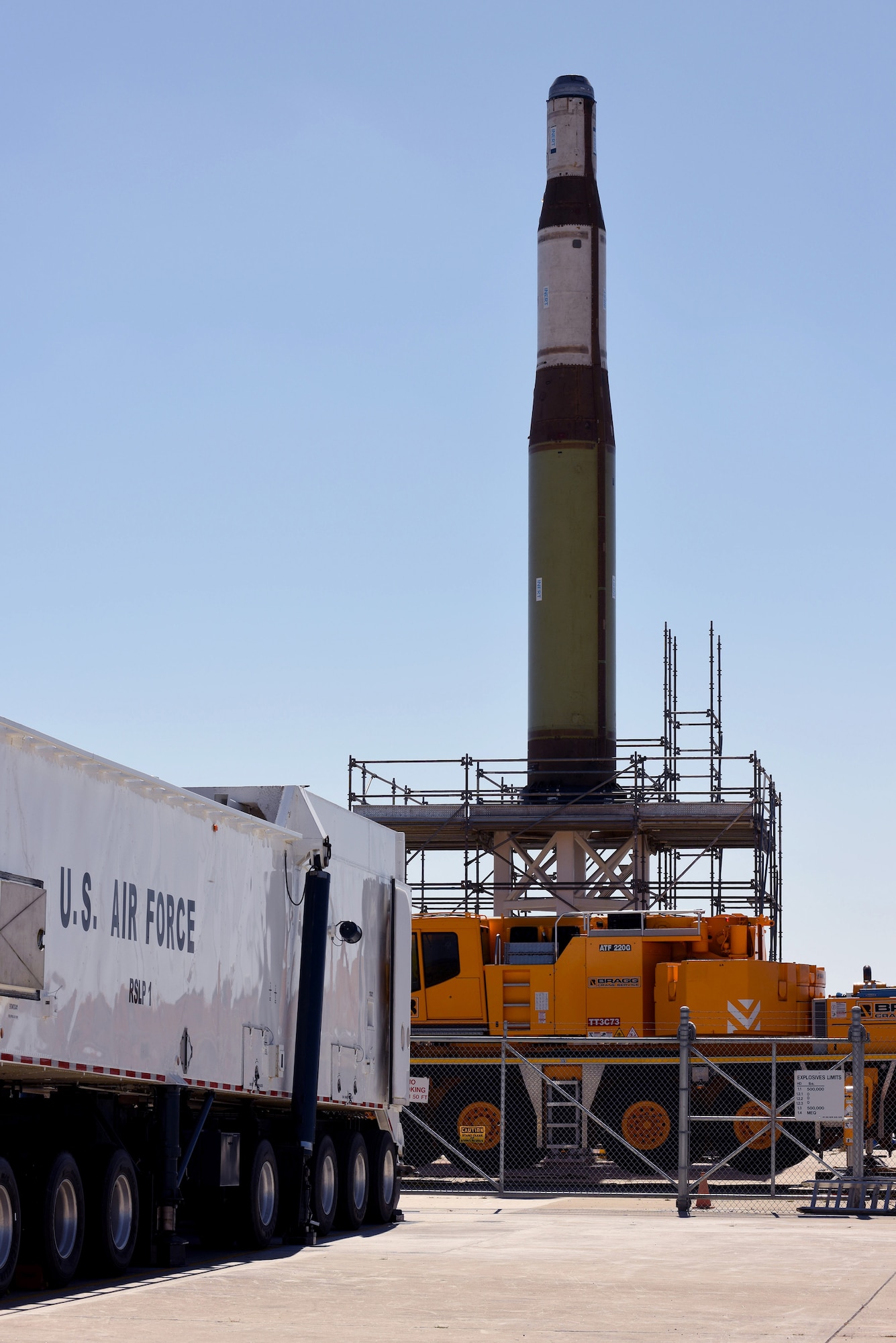 An inert Minuteman II Intercontinental Ballistic Missile stands erect on Test Pad 01, during a training operation, July 22, 2016, Vandenberg Air Force Base, Calif. Also known as Pathfinder operations, the regularly occurring exercise is designed to determine the operational capabilities involved in Intercontinental Ballistic Missile launches, while agencies from a multitude of regions and backgrounds work in cohesion. (U.S. Air Force photo by Staff Sgt. Shane Phipps/Released)
