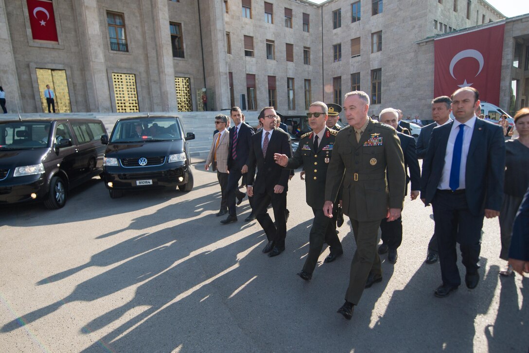 Marine Corps Gen. Joe Dunford, chairman of the Joint Chiefs of Staff, tours the Turkish Grand National Assembly with Gen. Hulusi Akar, chief of the Turkish General Staff, in Ankara, Turkey, Aug. 1, 2016. DoD photo by Navy Petty Officer 2nd Class Dominique A. Pineiro