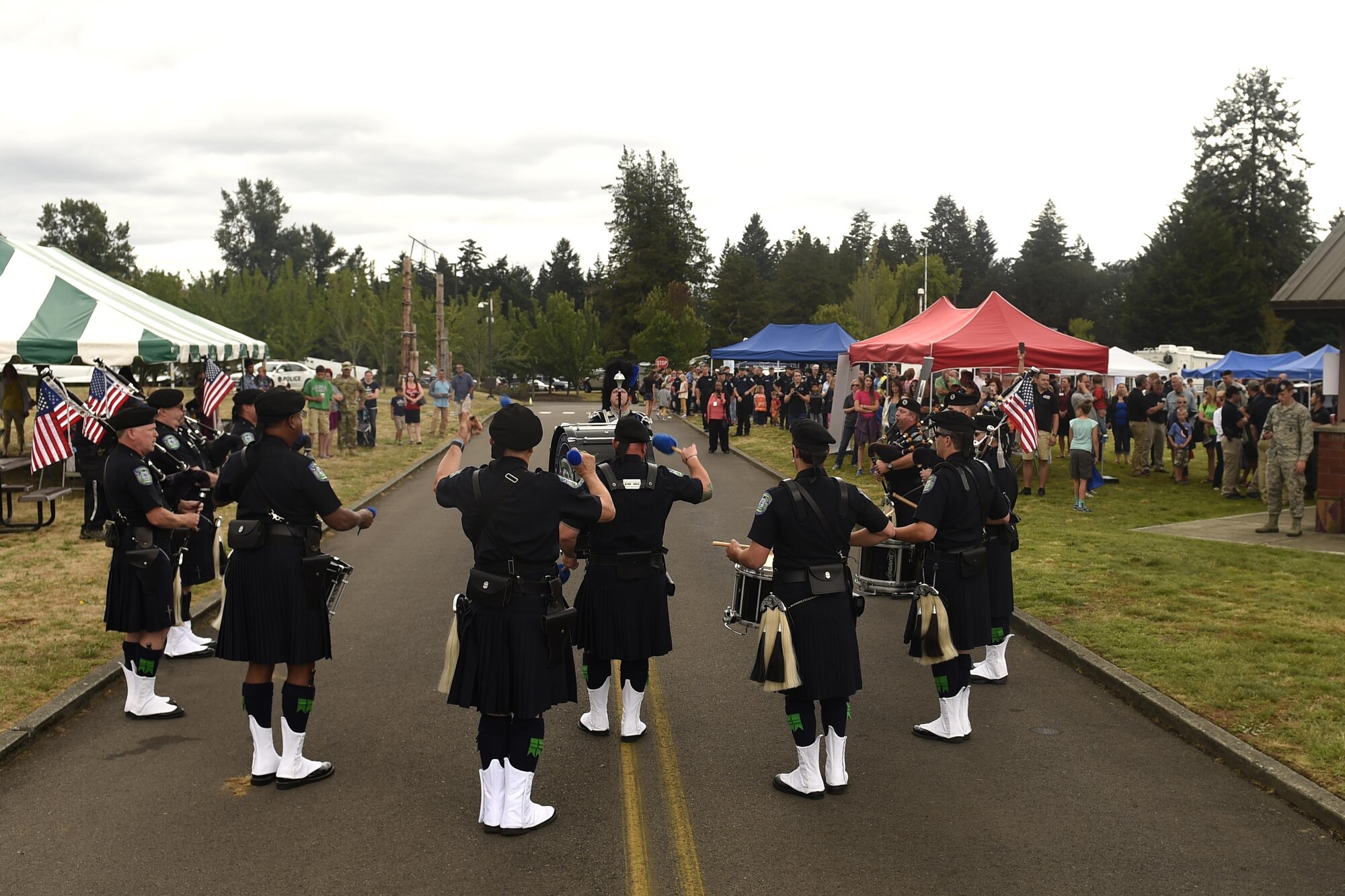 Members of the Seattle Police Department Pipes and Drums band perform at the “Stand with Those Who Serve,” annual public safety appreciation event July 23, 2016 at Joint Base Lewis-McChord, Wash. The event is in its sixth year and has been held at JBLM for two consecutive years. (U.S. Air Force photo/Tech. Sgt. Tim Chacon) 