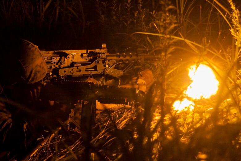 A U.S. Marine with Marine Wing Support Squadron (MWSS) 171 stationed at Marine Corps Air Station Iwakuni, Japan, fires an M249 squad automatic weapon at simulated enemy combatants during Exercise Eagle Wrath 2016 at Combined Arms Training Center Camp Fuji, July 28, 2016. During the culminating event, Marines established a mock air base including a landing zone and refueling point, constructed defensive and machine-gun positions, and conducted convoys and patrols over the course of four days. MWSS-171 conducts this exercise once a year in order to train all the Marines within the squadron, enhance their technical skills, field experience and military occupational specialty capability. (U.S. Marine Corps photo by Lance Cpl. Aaron Henson)