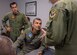 Colombian Air Force Brig. Gen. Sergio Andrés Garzón Vélez, center, the Combined Forces Air Component commander for exercise Panamax 16, and his aide receive an update during a commander’s update briefing at Davis-Monthan Air Force Base, Ariz., July 31, 2016. Panamax is an annual exercise sponsored by U.S. Southern Command that increases the ability of nations to work together and test their responsiveness in combined operations. (U.S. Air Force photo/Tech. Sgt. Heather R. Redman)