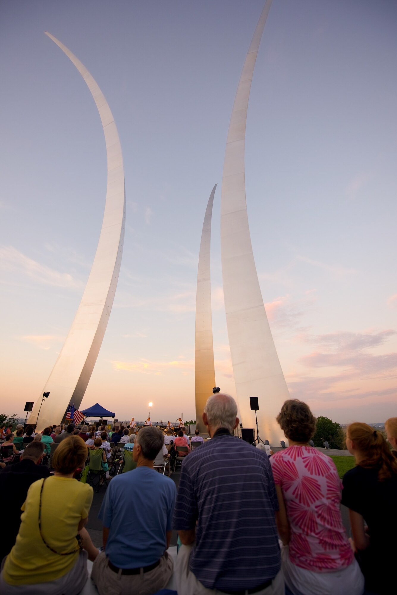 Fans of the U.S. Air Force Band listen to Celtic Aire, the Band's
premier Celtic and Folk ensemble, as they present a special program of
singers and songwriters of the Vietnam Era at the U.S. Air Force Memorial.
The concert was a collaboration between the U.S. Air Force Band and the
Headquarters Air Force Vietnam Commemoration Partner Program to honor
veterans of the Vietnam War. (U.S. Air Force Photo/Chief Master Sgt. Bob
Kamholz)