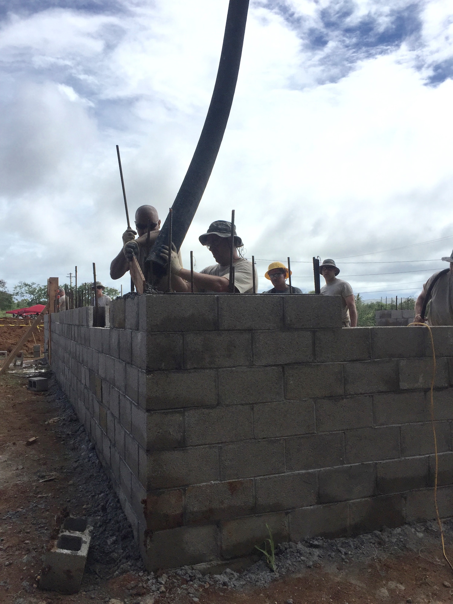 Members of the 102nd Civil Engineer Squadron traveled to the island of Guam as part of the Innovative Readiness Training Program Habitat for Humanity project.  Assisting in the construction of two homes, the team spent two weeks deployed to the U.S. Territory honing their construction skills while simultaneously contributing to the welfare and needs of the Guam community.