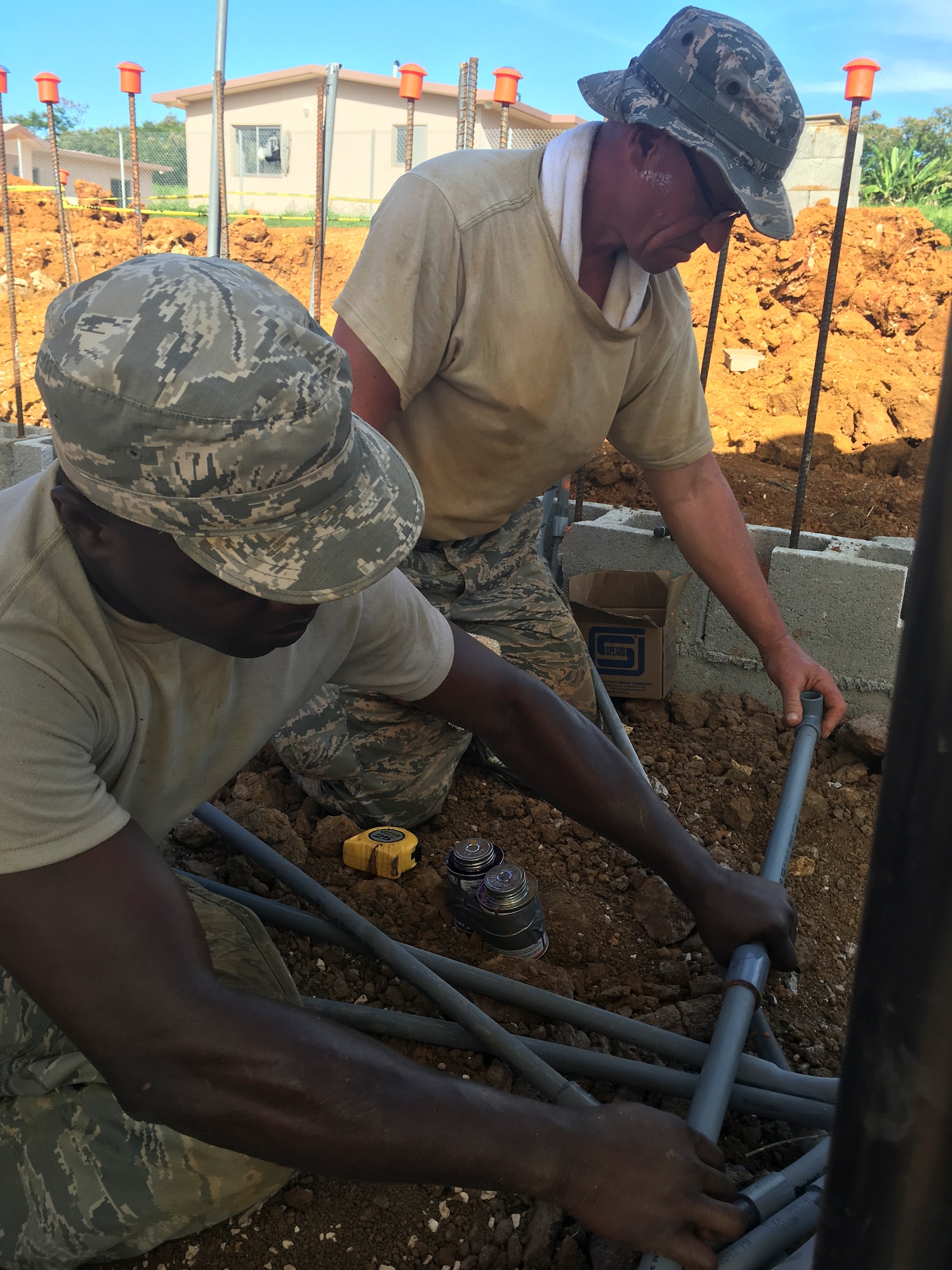 Members of the 102nd Civil Engineer Squadron traveled to the island of Guam as part of the Innovative Readiness Training Program Habitat for Humanity project.  Assisting in the construction of two homes, the team spent two weeks deployed to the U.S. Territory honing their construction skills while simultaneously contributing to the welfare and needs of the Guam community.
