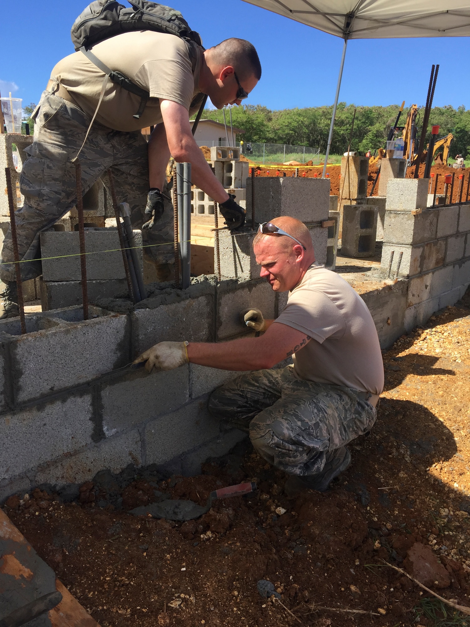 Members of the 102nd Civil Engineer Squadron traveled to the island of Guam as part of the Innovative Readiness Training Program Habitat for Humanity project.  Assisting in the construction of two homes, the team spent two weeks deployed to the U.S. Territory honing their construction skills while simultaneously contributing to the welfare and needs of the Guam community.
