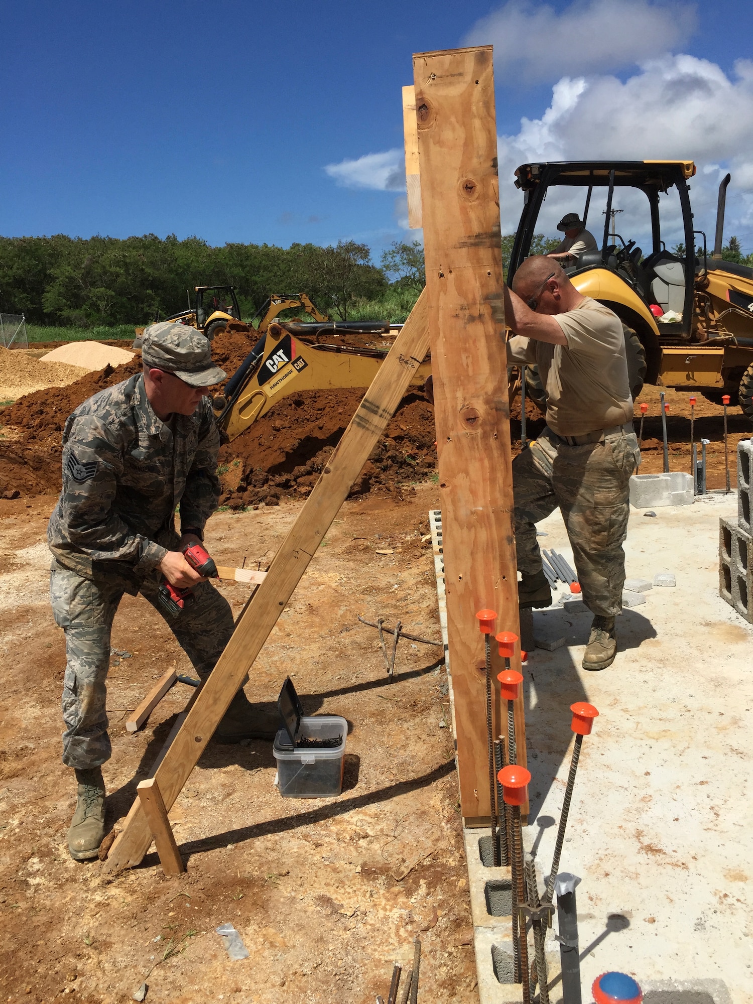 Members of the 102nd Civil Engineer Squadron traveled to the island of Guam as part of the Innovative Readiness Training Program Habitat for Humanity project.  Assisting in the construction of two homes, the team spent two weeks deployed to the U.S. Territory honing their construction skills while simultaneously contributing to the welfare and needs of the Guam community.