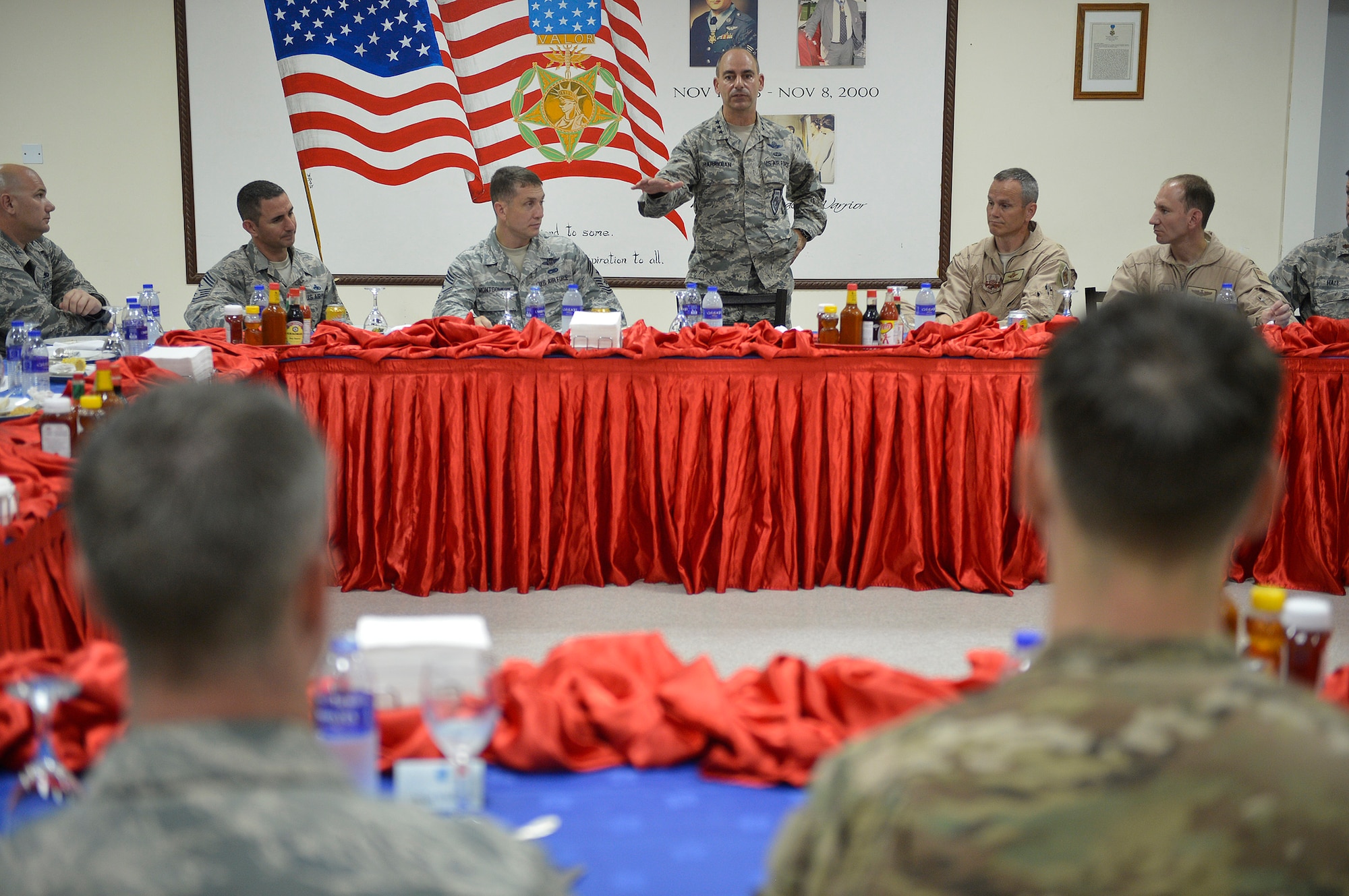 Lt. Gen. Jeffrey Harrigian, U.S. Air Forces Central Command commander, center, flanked by AFCENT and 380th Air Expeditionary Wing leadership, discusses the wing’s role in Operation Inherent Resolve and the future of combat operations in the region at an undisclosed location in Southwest Asia Aug. 1, 2016. This was Harrigian’s first visit to this operating location since taking command of AFCENT last month. (U.S. Air Force Photo by Tech. Sgt. Chad Warren/released)