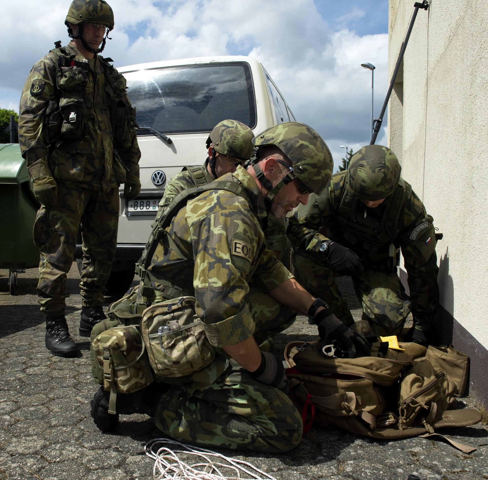 Army of the Czech Republic, explosive ordnance disposal members, prepare to disarm a simulated improvised explosive device during the IED Rodeo exercise at Spangdahlem Air Base, Germany, July 27, 2016. This multilateral exercise focused on locating and disarming improvised explosive devices which involved EOD members from the U.S., Czech Republic, Germany and Belgium. (U.S. Air Force photo by Airman 1st Class Preston L. Cherry/Realeased)