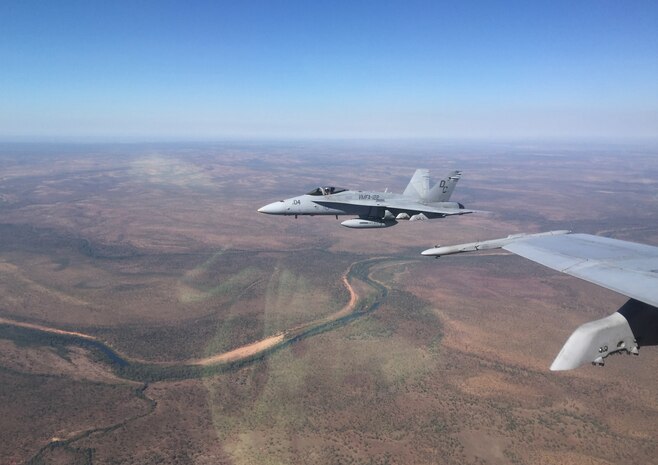 F/A-18C Hornets with Marine Fighter Attack Squadron (VMFA)122, conduct air operations during Exercise Pitch Black 2016 ata Royal Australian Air Force Base Tindal, Australia, July 25, 2016. Pitch Black 16 is a biennial, three week, multinational, large-force training exercise hosted by RAAF Tindal. The allied nation squadrons will execute day and night flights from Tindal to Darwin, while performing large force offensive counter-air and offensive air support operations throughout the exercise. (U.S. Marine Corps courtesy photo)