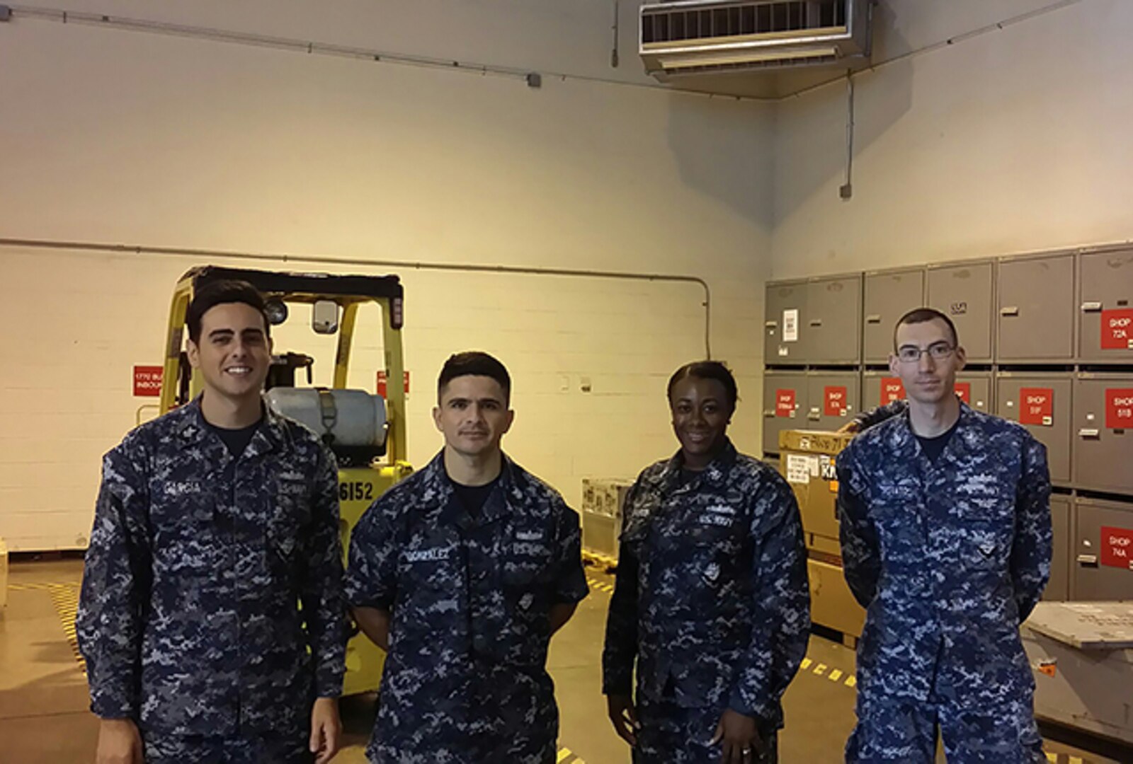 Pictured are (l-r): LS2 Gregory Garcia; LS2 Alvaro Gonzalez; LS2 Chanell Edwards; and LS1 James Trovato. 