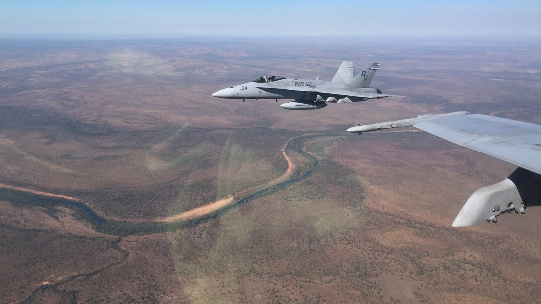 F/A-18C Hornets with Marine Fighter Attack Squadron 122, conduct air operations during Exercise Pitch Black 2016 ata Royal Australian Air Force Base Tindal, Australia, July 25, 2016. Pitch Black 16 is a biennial, three week, multinational, large-force training exercise hosted by RAAF Tindal. The allied nation squadrons will execute day and night flights from Tindal to Darwin, while performing large force offensive counter-air and offensive air support operations throughout the exercise.