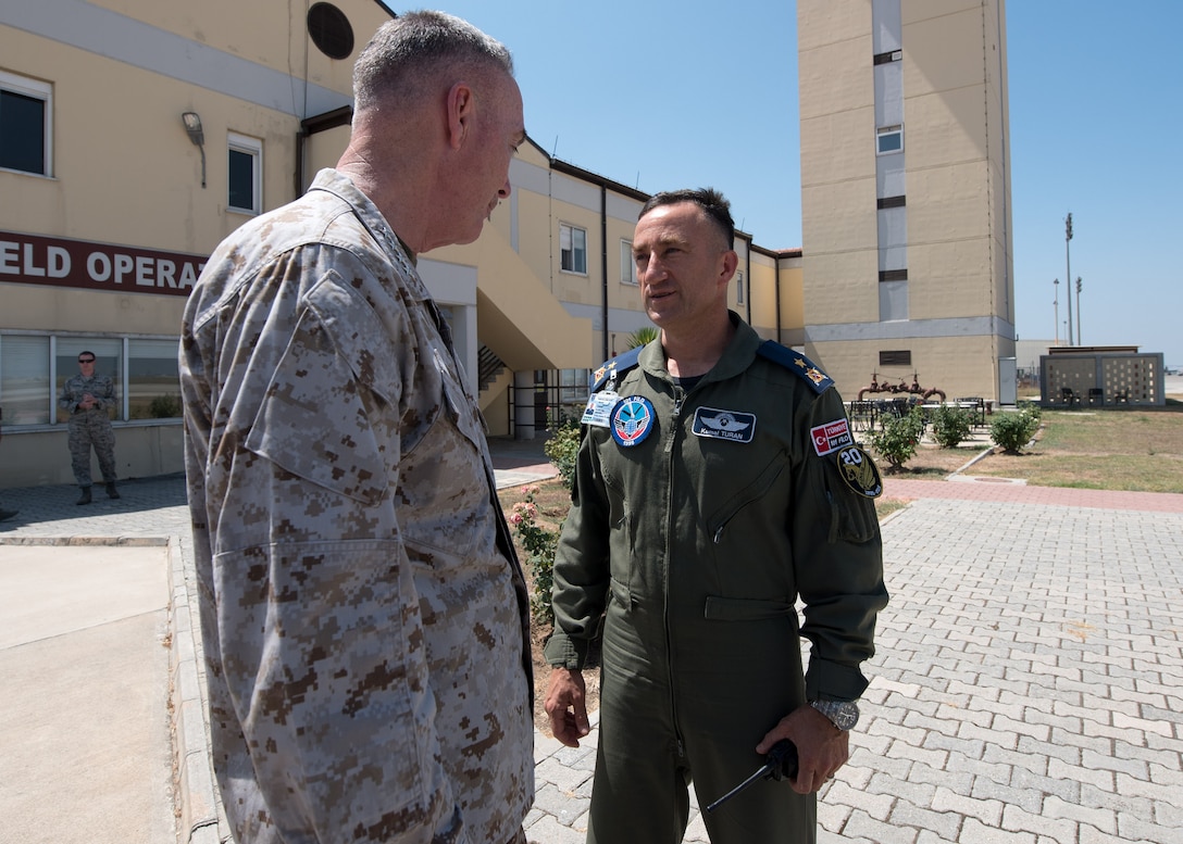 Marine Corps Gen. Joe Dunford, left, chairman of the Joint Chiefs of Staff, speaks with Turkish Air Force Brig. Gen. Kemal Turan before departing Incirlik Air Base, Turkey, Aug. 2, 2016. DoD photo by Navy Petty Officer 2nd Class Dominique A. Pineiro