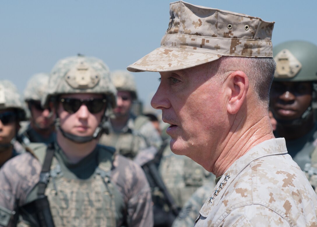 Marine Corps Gen. Joe Dunford, chairman of the Joint Chiefs of Staff, talks to airmen following a field exercise at Incirlik Air Base, Turkey, Aug. 2, 2016. The airmen are assigned to the 39th Security Forces Squadron base defense operations center. DoD photo by Navy Petty Officer 2nd Class Dominique A. Pineiro