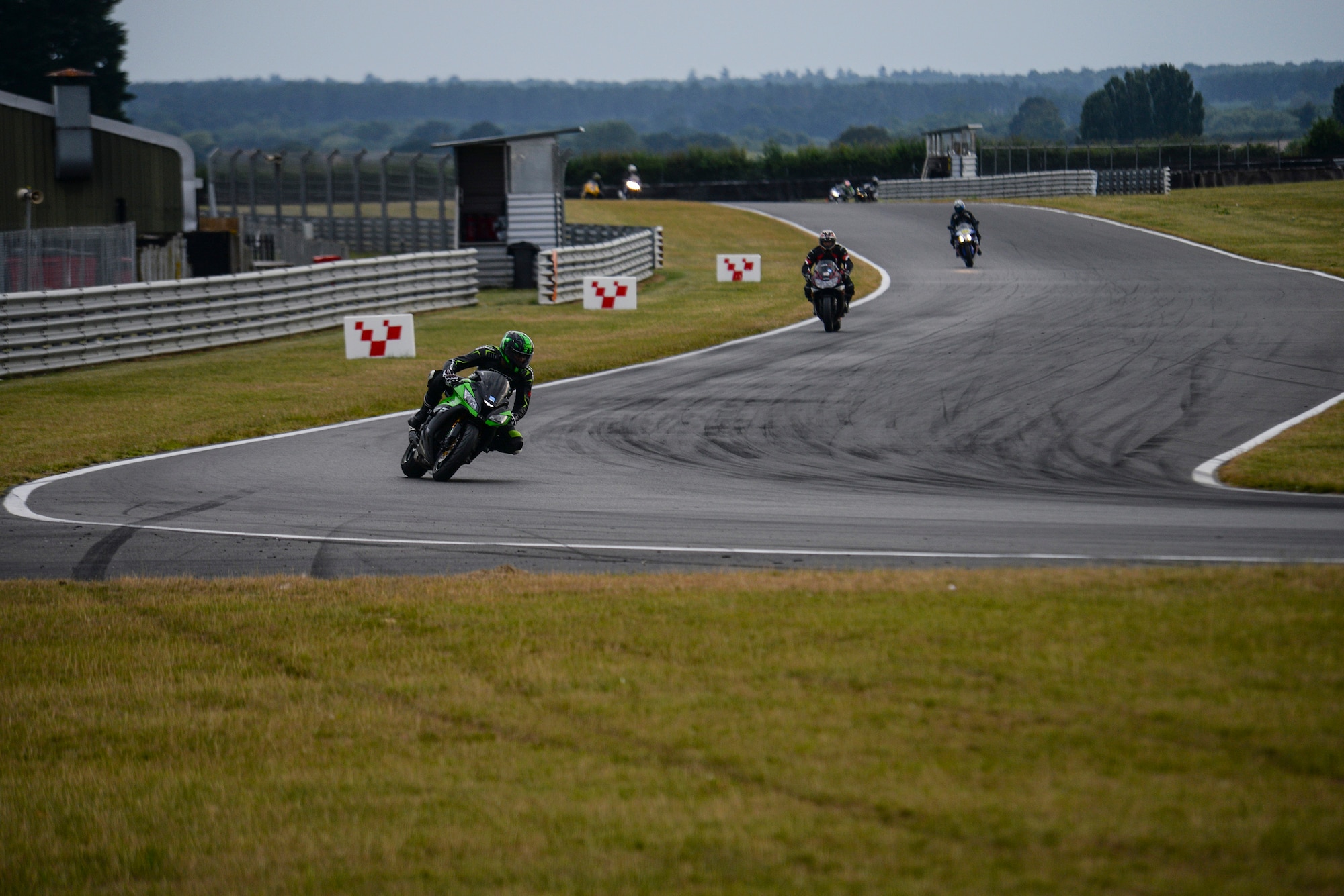 Participants in the Military Track Day ride their motorcycles July 26, 2016, at Snetterton Circuit in Norwich, England. Motorcycle safety instructors along with track instructors rode with riders to ensure safety and provide training tips. (U.S. Air Force photo by Staff Sgt. Micaiah Anthony)