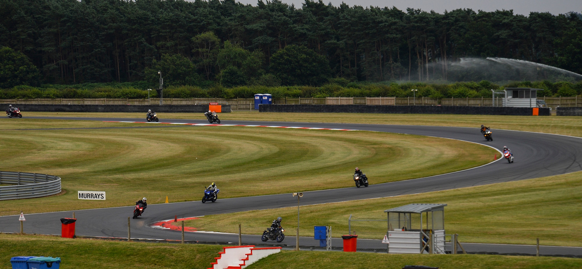 Participants in the Military Track Day ride their motorcycles July 26, 2016, at Snetterton Circuit in Norwich, England. The track day was coordinated to boost rider confidence and skill. (U.S. Air Force photo by Staff Sgt. Micaiah Anthony)