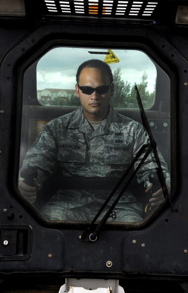 Tech. Sgt. Michael Asuncion Jr, 5th Bomb Wing NCO in charge of administration, sits in a Bobcat skid steer at Minot Air Force Base, N.D., July 12, 2016. Asuncion was named one of the 12 Outstanding Airmen of the Year for 2015 when he was a “dirt boy” at Patrick AFB, Fla. (U.S. Air Force photo/Airman 1st Class Christian Sullivan)