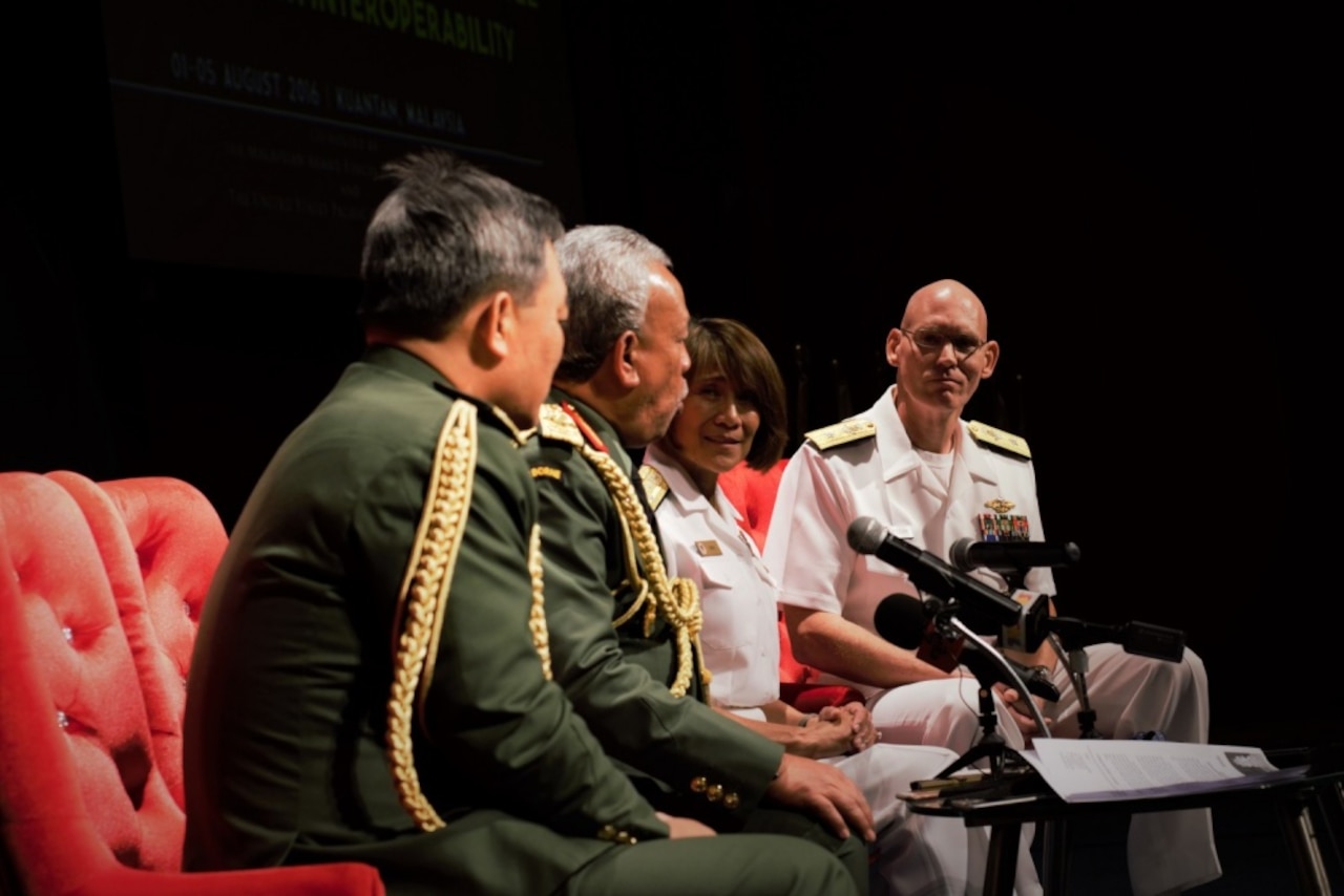 Navy Vice Adm. Raquel C. Bono, second from right, director of the Defense Health Agency; and Navy Rear Adm. Brian S. Pecha, right, U.S. Pacific Command chief surgeon, listen to Gen. Tan Sri Dato’ Sri (Dr) Zulkifeli bin Mohd Zin, second from left, Malaysia’s Chief of Defense, during a press conference at the opening ceremony of the 2016 Asia Pacific Military Health Exchange at Kuantan, Malaysia, Aug. 1, 2016. DoD photo by Air Force Master Sgt. Todd Kabalan