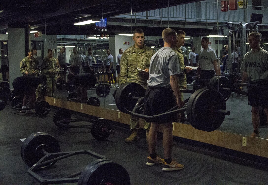 Army Reserve instructor from Task Force Wolf grades a Cadet performing a dead lift for the Occupational Physical Assessment Test at U.S. Army Cadet Command during Cadet Summer Training (CST16), Ft. Knox, Kentucky, July 25. (U.S. Army Reserve photo by Sgt. Karen Sampson/ Released)