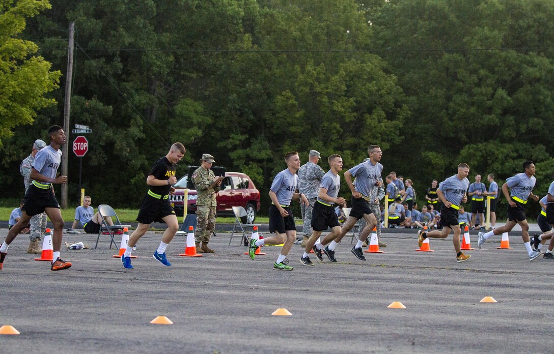 Army Reserve drill sergeants from Task Force Wolf grade Cadets performing the aerobic interval run for the Occupational Physical Assessment Test at U.S. Army Cadet Command during Cadet Summer Training (CST16), Ft. Knox, Kentucky, July 25. (U.S. Army Reserve photo by Sgt. Karen Sampson/ Released)