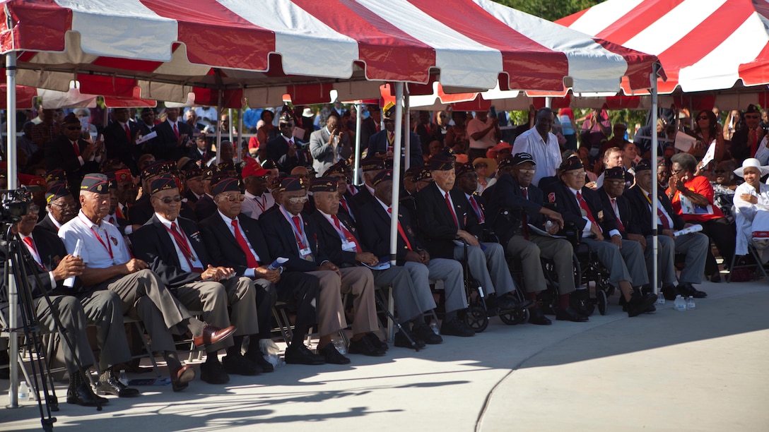 U.S. service members and guests attend the Montford Point Marine Memorial dedication ceremony held at Jacksonville, North Carolina, July 29, 2016.The memorial was built in honor of the 20,000 African-Americans who attended training at Montford Point. 