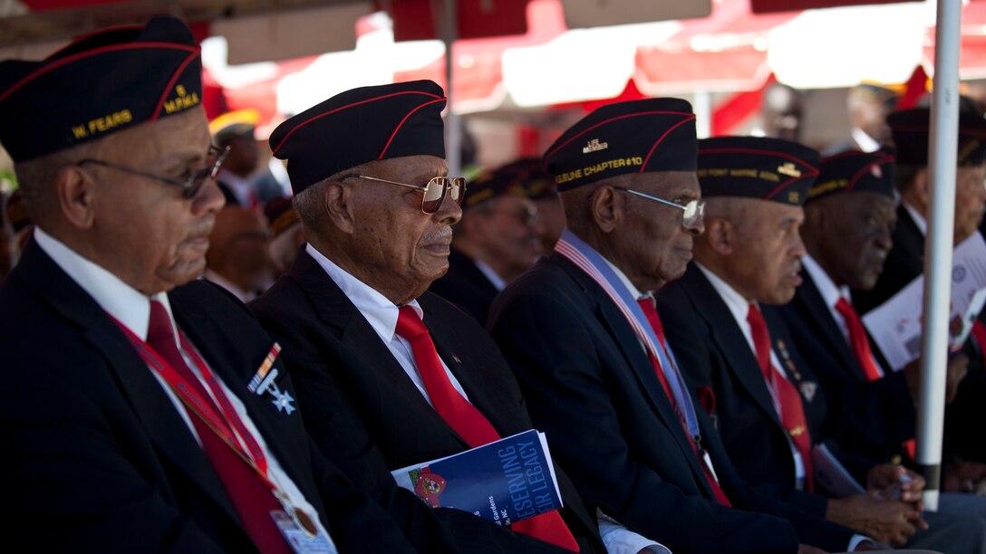 U.S. service members and guests attend the Montford Point Marine Memorial dedication ceremony held at Jacksonville, North Carolina, July 29, 2016. The memorial was built in honor of the 20,000 African-Americans who attended training at Montford Point. 