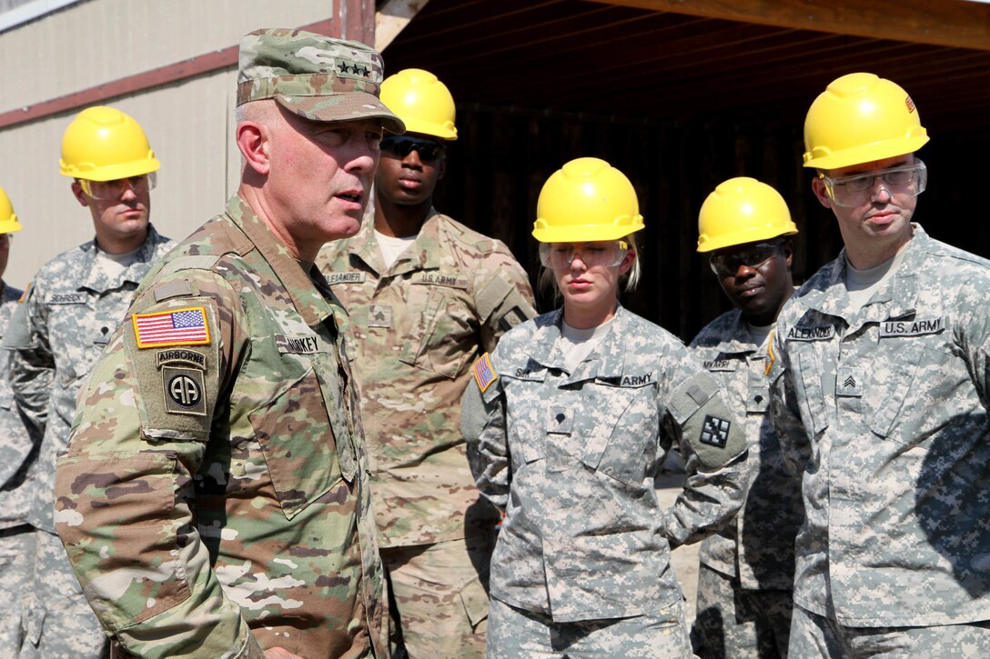 Over a dozen students and instructors from the second phase of the 80th Training Command's carpentry and masonry specialist course met with Lieutenant General Charles D. Luckey, the commanding general of the United States Army Reserve, for an impromptu Q& A session at Tactical Training Center-Fort Dix, N.J. July 16, 2016. With numerous courses taught over a twelve month period, instructors at TTC Dix train about 150 soldiers every calendar year in construction, carpentry and masonry, electrical engineering, and plumbing.