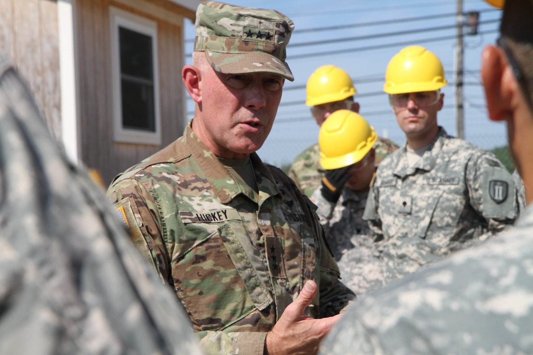 More than a dozen students and instructors from the second phase of the 80th Training Command's carpentry and masonry specialist course met with Lieutenant General Charles D. Luckey, the commanding general of the United States Army Reserve, for an impromptu question and answer session at Tactical Training Center Dix,  Fort Dix, N.J. July 16, 2016. With numerous courses taught over a twelve month period, instructors at TTC Dix train about 150 soldiers every calendar year in construction, carpentry and masonry, electrical engineering, and plumbing.