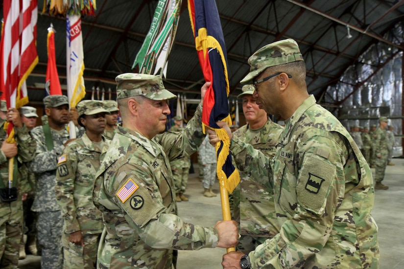 Brig. Gen. Hector Lopez, incoming commander of the 94th Training Division (Force Sustainment), accepts the division's colors from the commanding general of the 80th Training Command (TASS), Maj. Gen. A. C. Roper, during a change of command ceremony at Fort Lee, Va., July 23, 2016.  The 94th provides world class training in the career management fields of Ordnance, Transportation, Quartermaster, and Human Resources, ensuring all service members are properly trained, fed, supplied, and maintained.