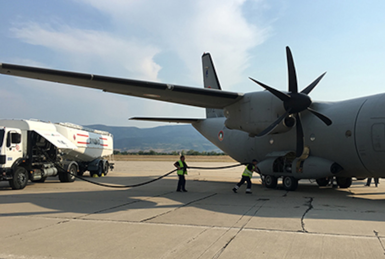 A ground crew fuels a Bulgarian C-27 Spartan aircraft at Plovdiv Airport in Bulgaria during Thracian Summer 2016, a joint U.S. and Bulgarian field training deployment exercise held July 9-22. Defense Logistics Agency Energy coordinated the acquisition and delivery of 1.5 million gallons of jet fuel in support of the exercise. 