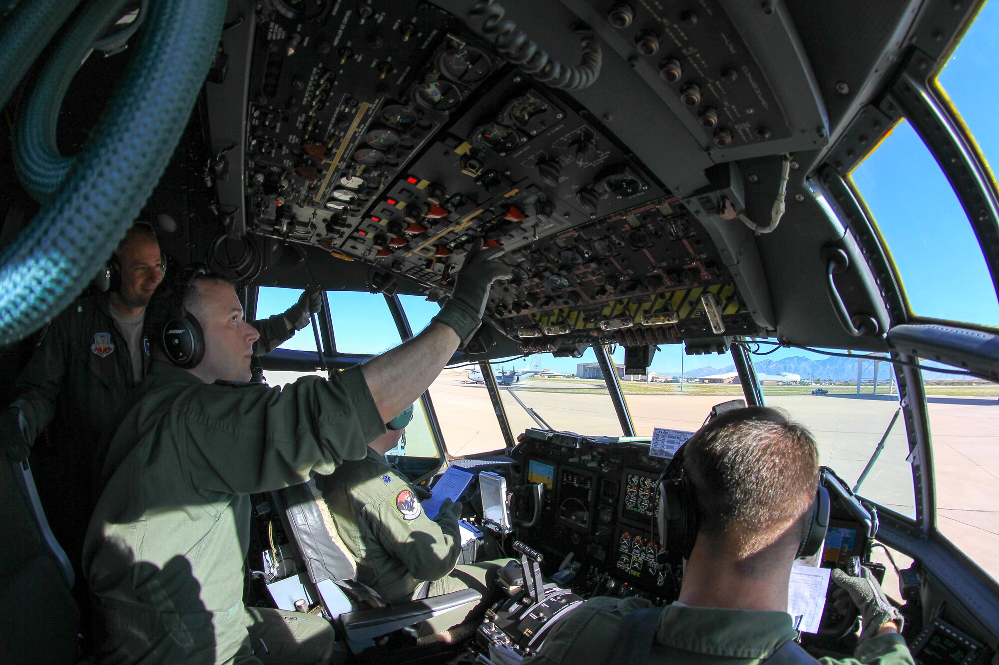 U.S. Airmen from the 42nd Electronic Combat Squadron perform pre-flight checks in an EC-130H Compass Call before executing its first training mission with an upgraded cockpit acquired via an avionic viability program at Davis-Monthan Air Force Base, Ariz., July 11, 2016. The 42nd ECS’s Compass Calls were the first to be upgraded in an Air Force-wide plan to update its entire fleet of EC-130s via the AVP. (Courtesy photo/Released)