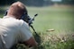 An 11th Security Support Squadron Combat Arms instructor shoots a Barrett M107 rifle at Marine Corps Base Quantico, Va., July 15, 2016. Joint Base Andrews combat arms instructors shot two weapon systems to familiarize themselves with the weapons to instruct other service members requiring sniper training. (U.S. Air Force photo by Airman 1st Class Philip Bryant)