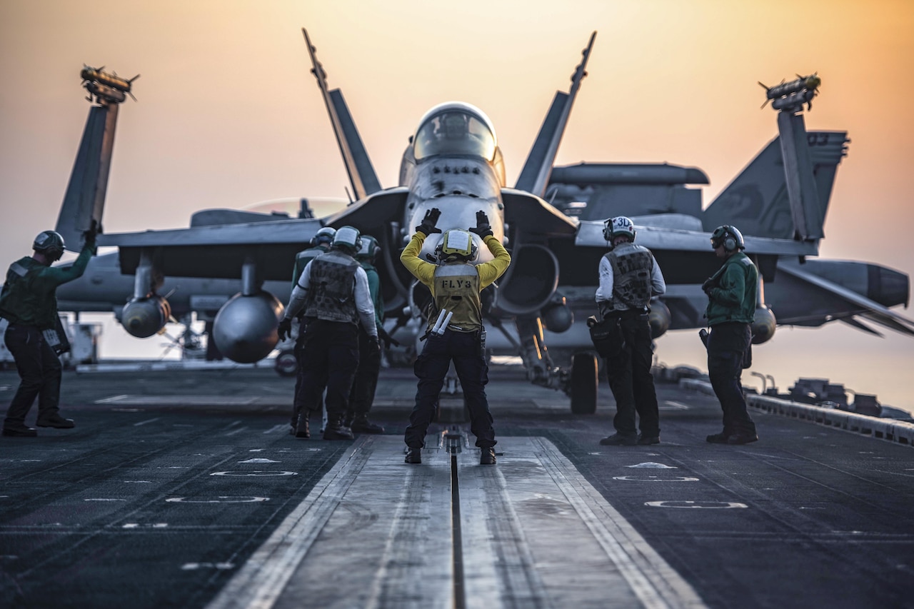 An F/A-18C Hornet taxis onto the catapult on the flight deck of the aircraft carrier USS Dwight D. Eisenhower in the Arabian Gulf, July 31, 2016. The Eisenhower is supporting Operation Inherent Resolve, maritime security operations and theater security cooperation efforts in the U.S. 5th Fleet area of operations. Navy photo by Petty Officer 3rd Class J. Alexander Delgado