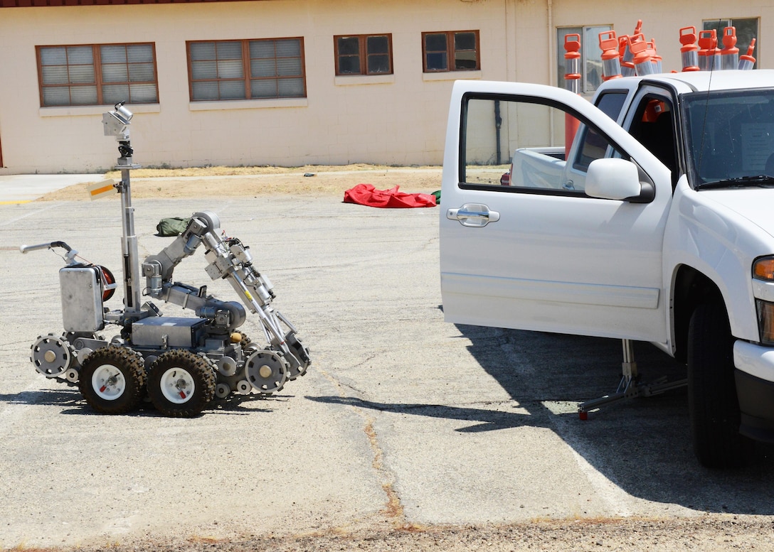 Edwards AFB Explosive Ordnance Disposal was called in when a simulated bomb was discovered in a pickup truck during Exercise Desert Wind 16-05 Aug. 1. Their bomb robot was sent in to investigate. (U.S. Air Force photo by Kenji Thuloweit)
