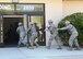 Members of the 412th Security Forces Squadron storm Bldg. 2850 looking for an active shooter during Exercise Desert Wind 16-05 Aug. 1. (U.S. Air Force photo by Kenji Thuloweit
