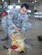 Staff Sgt. Anthony Anderson, a conventional maintenance crew chief and munitions inspector assigned to the 28th Munitions Squadron, works to connect a lanyard to a pin connected to the bomb tail at Ellsworth Air Force Base (AFB), S.D., July 20, 2016. Anderson said one of the many things that keeps him motivated is seeing his work pay off downrange and encourages Airmen to always have a positive attitude. (U.S. Air Force photo by Airman 1st Class Sadie Colbert)