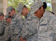 The chaplain candidates return from a 2.8 mile ruck march at Robins Air Force Base, Georgia, July 25, 2016. During the last week of the Air Force Reserve Command Chaplain Candidate Intensive Interview program, the candidates were immersed in fast-paced mobility training conducted by active-duty instructors from the 5th CBCSS. This mobility training, typically a two-week process, was condensed and compacted to fit into the two-day window the candidates had available. 