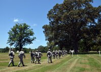 The chaplain candidates return from a 2.8 mile ruck march at Robins Air Force Base, Georgia, July 25, 2016. During the last week of the Air Force Reserve Command Chaplain Candidate Intensive Interview program, the candidates were immersed in fast-paced mobility training conducted by active-duty instructors from the 5th CBCSS. This mobility training, typically a two-week process, was condensed and compacted to fit into the two-day window the candidates had available. 