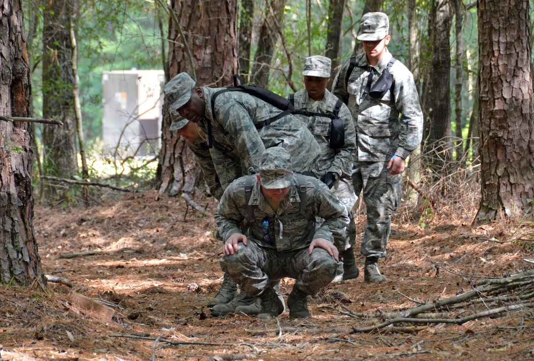 The chaplain candidates return from a 2.8 mile ruck march at Robins Air Force Base, Georgia, July 25, 2016. During the last week of the Air Force Reserve Command Chaplain Candidate Intensive Interview program, the candidates were immersed in fast-paced mobility training conducted by active-duty instructors from the 5th CBCSS. This mobility training, typically a two-week process, was condensed and compacted to fit into the two-day window the candidates had available. 