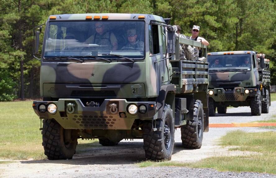 Chaplain candidates drive and ride in an M1078 light medium tactical vehicle at Robins Air Force Base, Ga, July 25. The candidates are participants in the Air Force Reserve Command Chaplain Candidate Intensive Interview program which aims to provide an extensive overview of the Air Force Reserve mission and military chaplain corps.(U.S. Air Force photo/Tech. Sgt. Kelly Goonan)