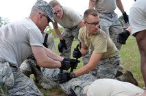 The chaplain candidates return from a 2.8 mile ruck march at Robins Air Force Base, Georgia, July 25, 2016. During the last week of the Air Force Reserve Command Chaplain Candidate Intensive Interview program, the candidates were immersed in fast-paced mobility training conducted by active-duty instructors from the 5th CBCSS. This mobility training, typically a two-week process, was condensed and compacted to fit into the two-day window the candidates had available. 