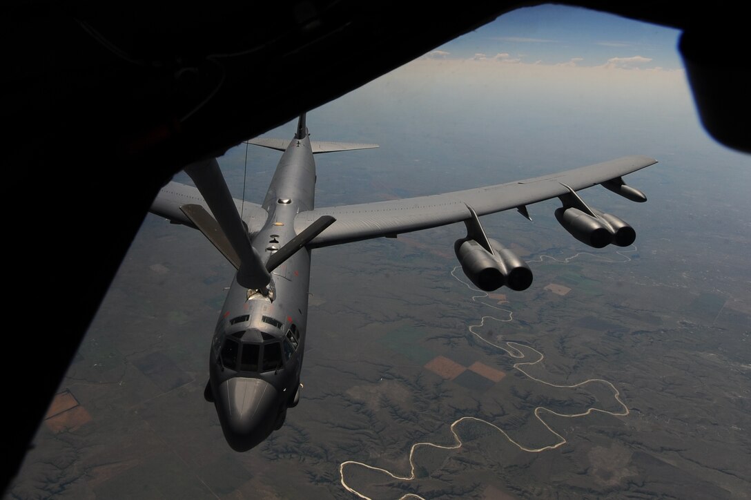 A KC-135 Stratotanker refuels a B-52 Stratofortress, July 31, 2016. Polar Roar included three non-stop, simultaneous strategic bomber routes. The B-52s and B-2 Spirits demonstrated the ability to provide a flexible and vigilant long-range global-strike capability. (U.S. Air Force photo/Airman 1st Class Christopher Thornbury)