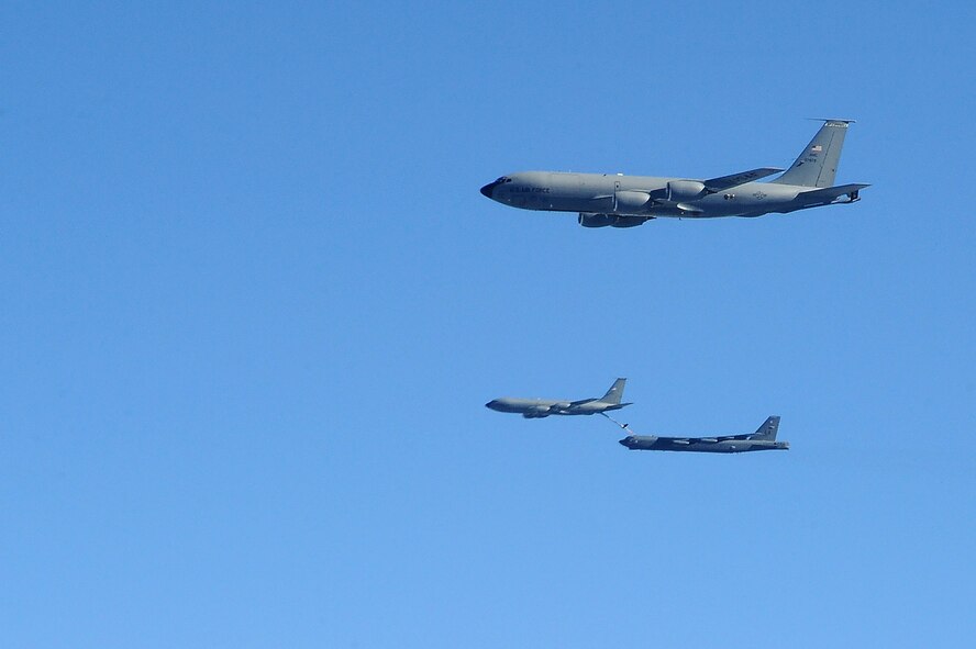 A KC-135 Stratotanker refuels a B-52 Stratofortress, above Minnesota, July 31, 2016. Four of McConnell's KC-135s provided a non-stop flight for two B-52s to participate in Polar Roar, a mission held in the Arctic Circle. Polar Roar included three non-stop, simultaneous strategic bomber routes. The B-52s and B-2 Spirits demonstrated the ability to provide a flexible and vigilant long-range global-strike capability. (U.S. Air Force photo/Airman 1st Class Christopher Thornbury)