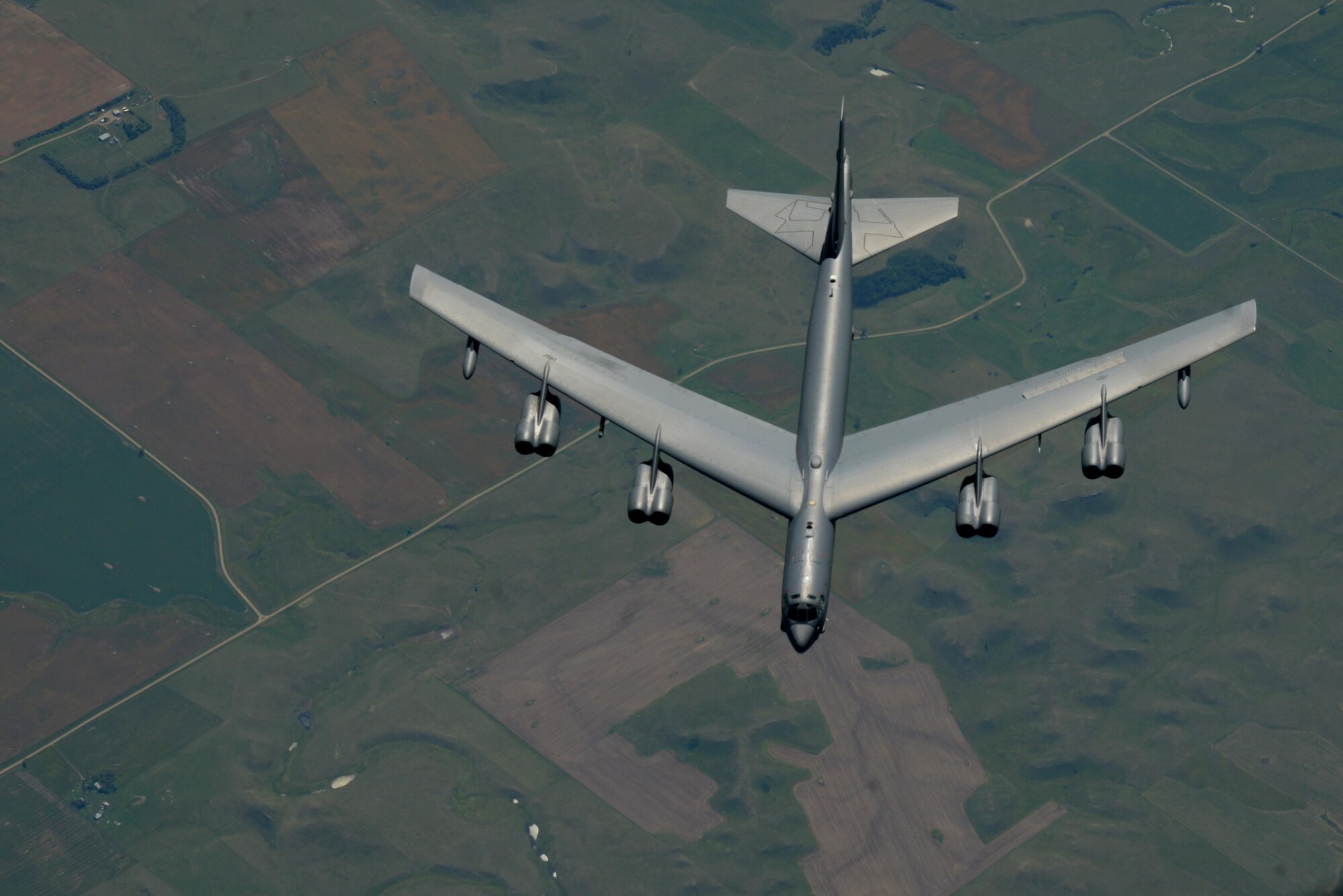 A B-52 Stratofortress soars above Minnesota enroute to Polar Roar, July, 31, 2016. Polar Roar is a mission held in the Arctic Circle that demonstrates the ability to provide a flexible and vigilant long-range global-strike capability. (U.S. Air Force photo/Airman 1st Class Christopher Thornbury)