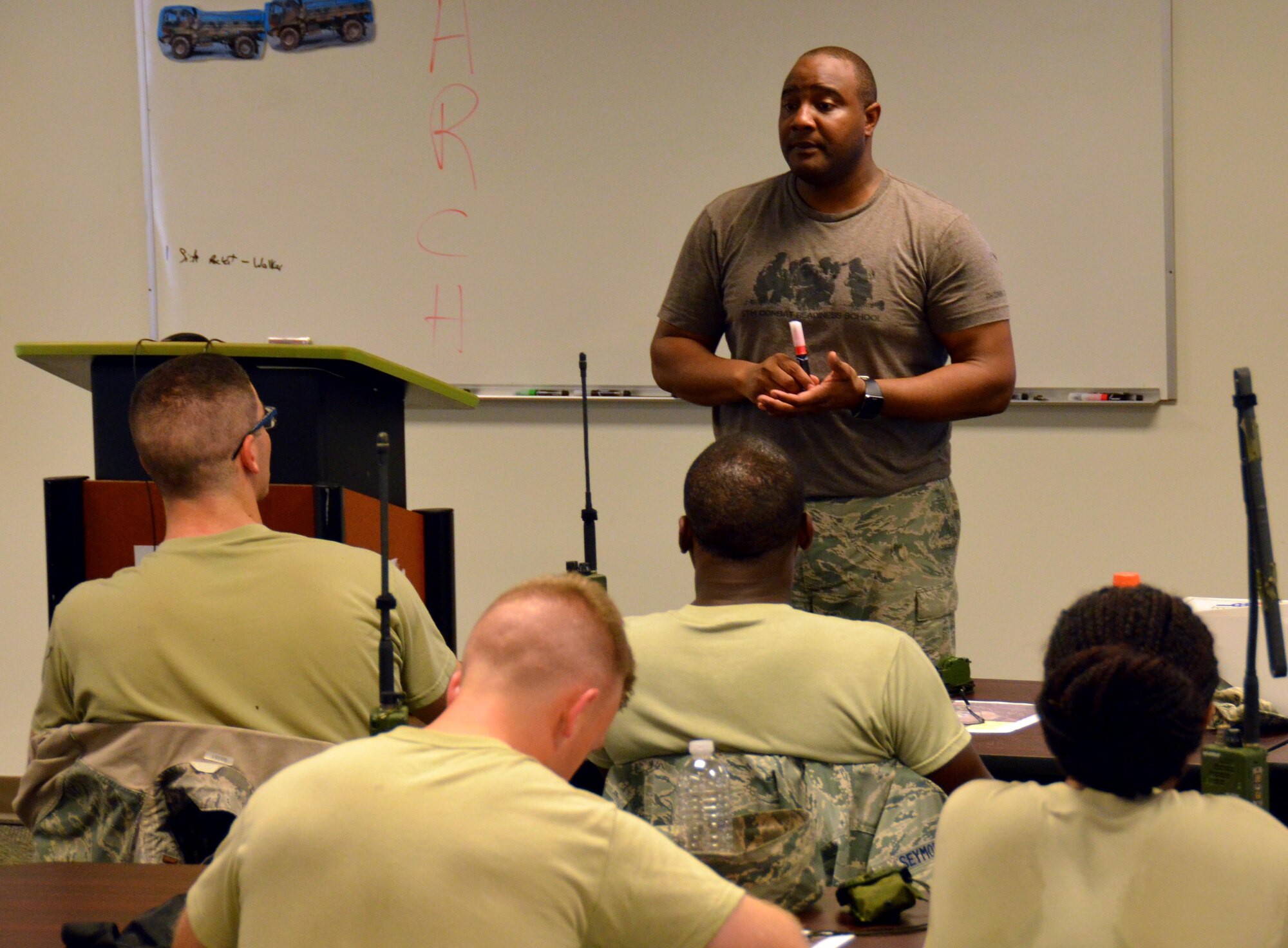 Instructor and Independent Duty Medical Technician, Tech. Sgt. Alfonte Thomas, 5th Combat Communications Squadron Support, provides self-aid buddy care classroom instruction to twenty-five chaplain candidates at Robins Air Force Base, Georgia, July 25, 2016. The candidates are participants in the Air Force Reserve Command Chaplain Candidate Intensive Interview program which aims to provide an extensive overview of what the Air Force Reserve mission is as well as a broad overview of the military chaplain corps.(U.S. Air Force photo/Tech. Sgt. Kelly Goonan)